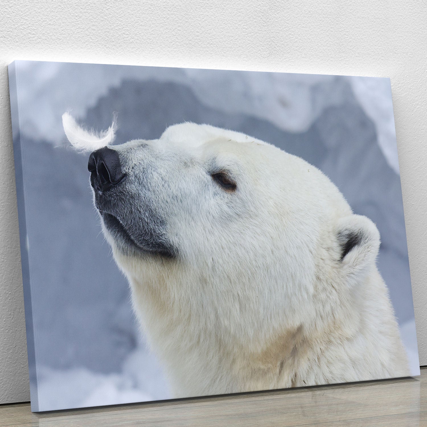 A beautiful polar bear depicted on a white canvas print, showcasing its majestic presence in a serene setting.