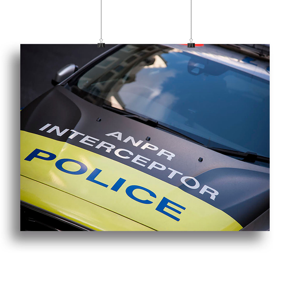 A vibrant canvas print of a police car, showcasing its sleek design and colors, perfect for home or office decor.