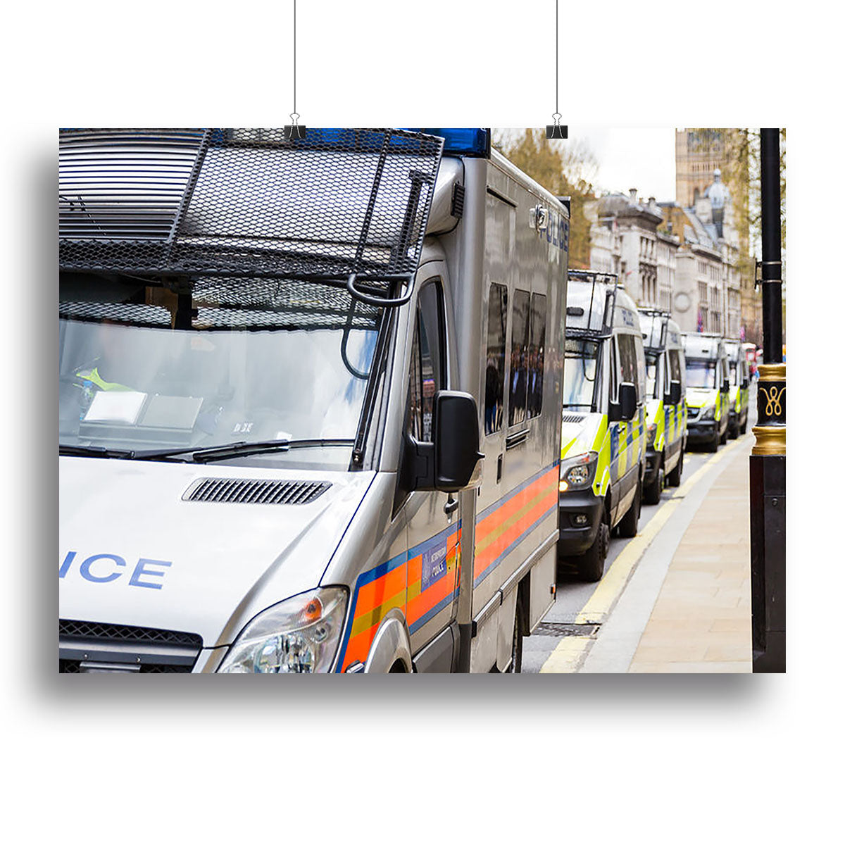 Canvas print featuring a row of police vans, showcasing vibrant colors and detailed design, perfect for home or office decor.