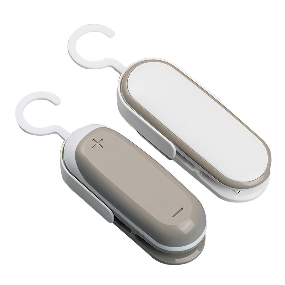 A compact Portable Heat Sealer Mini Sealing Machine designed for sealing plastic food bags, showcasing its sleek design and user-friendly features.