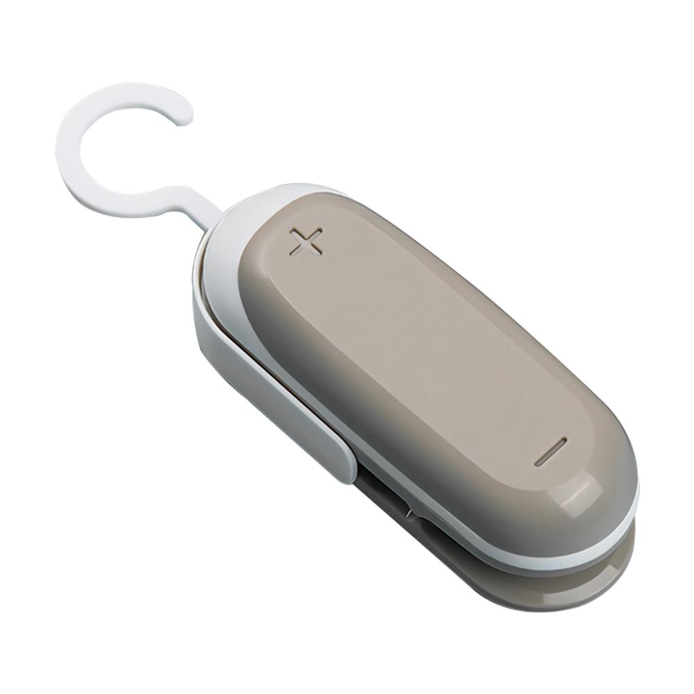 A compact Portable Heat Sealer Mini Sealing Machine designed for sealing plastic food bags, showcasing its sleek design and user-friendly features.