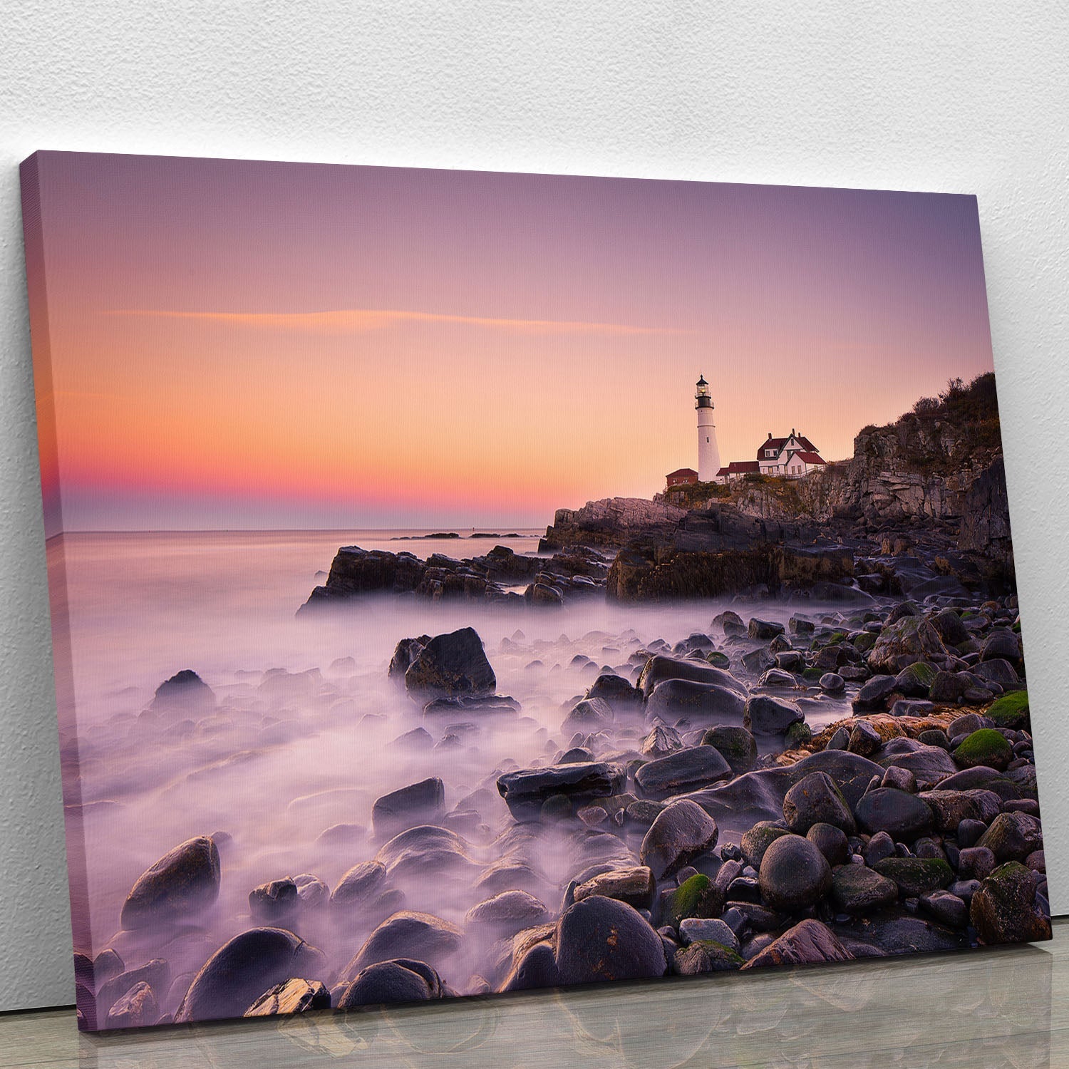 A beautiful canvas print of the Portland Headlight lighthouse, showcasing its iconic structure against a serene coastal backdrop.