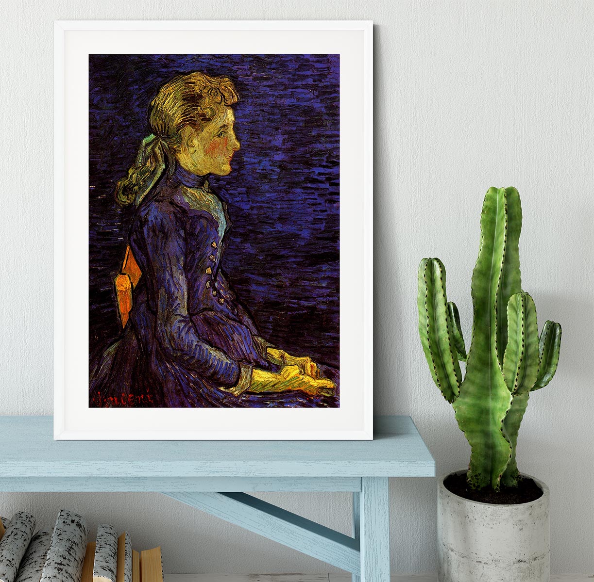 Framed print of Van Gogh's Portrait of Adeline Ravoux, showcasing vibrant colors and intricate details in a stylish frame.