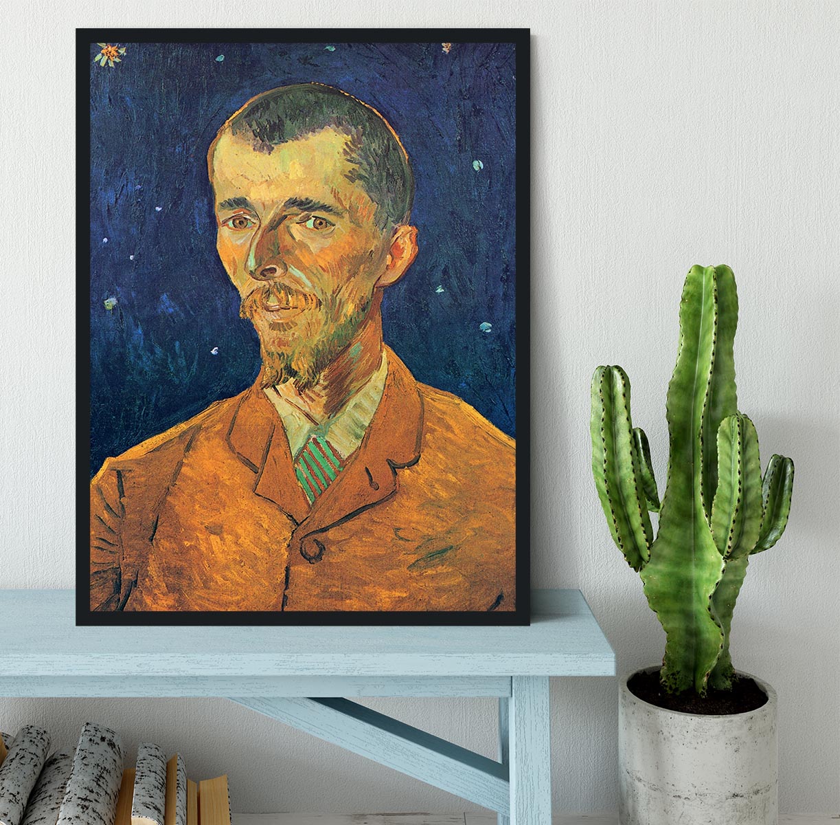 Framed print of Van Gogh's Portrait of Eugene Boch, showcasing vibrant colors and intricate details in a stylish handmade frame.