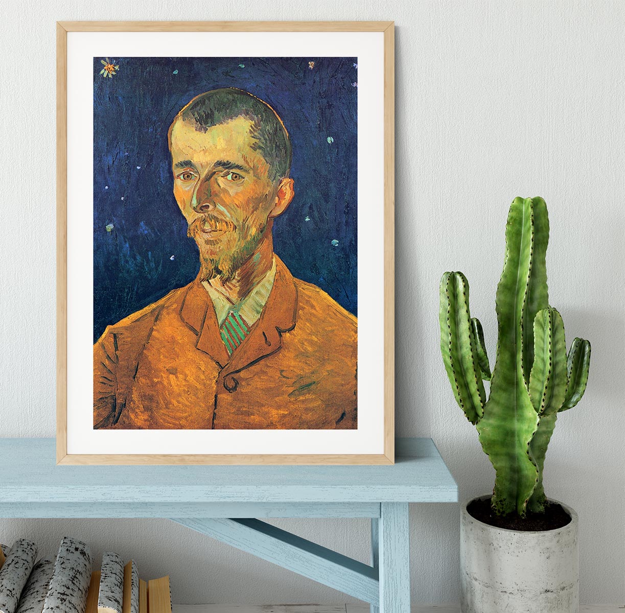 Framed print of Van Gogh's Portrait of Eugene Boch, showcasing vibrant colors and intricate details in a stylish handmade frame.