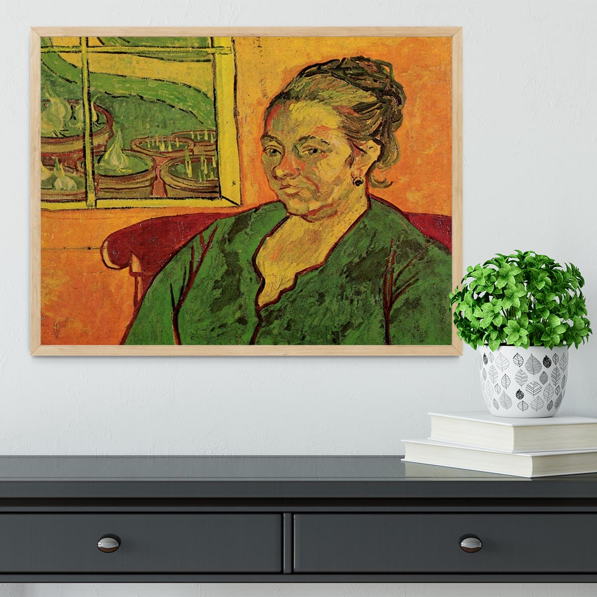 Framed print of Van Gogh's Portrait of Madame Augustine Roulin, showcasing vibrant colors and intricate details.