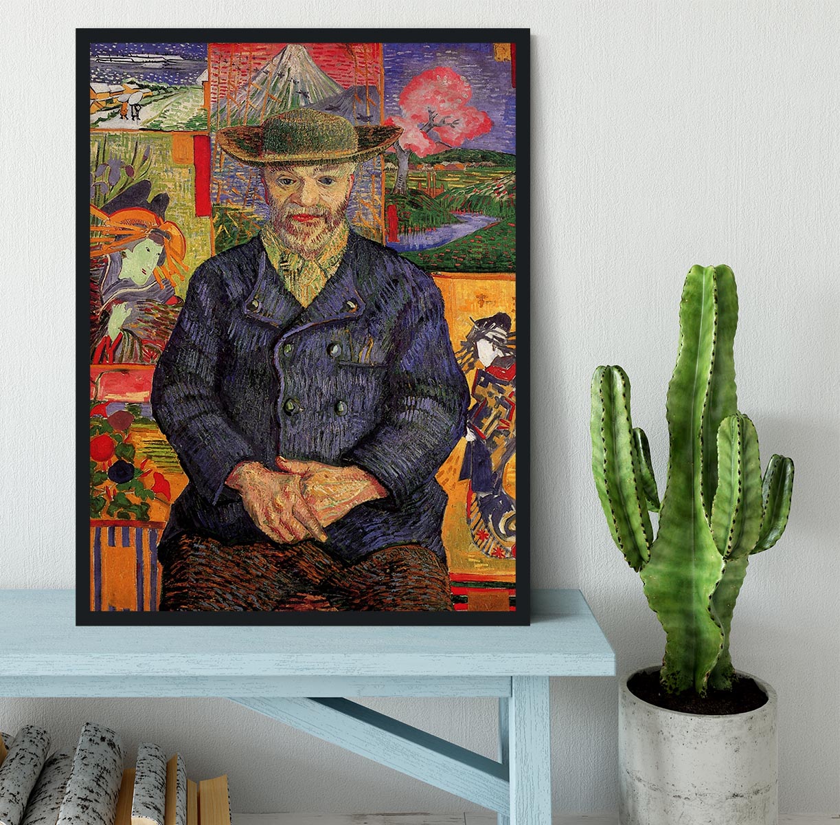 Framed print of Van Gogh's Portrait of Pere Tanguy, showcasing vibrant colors and a handmade frame.