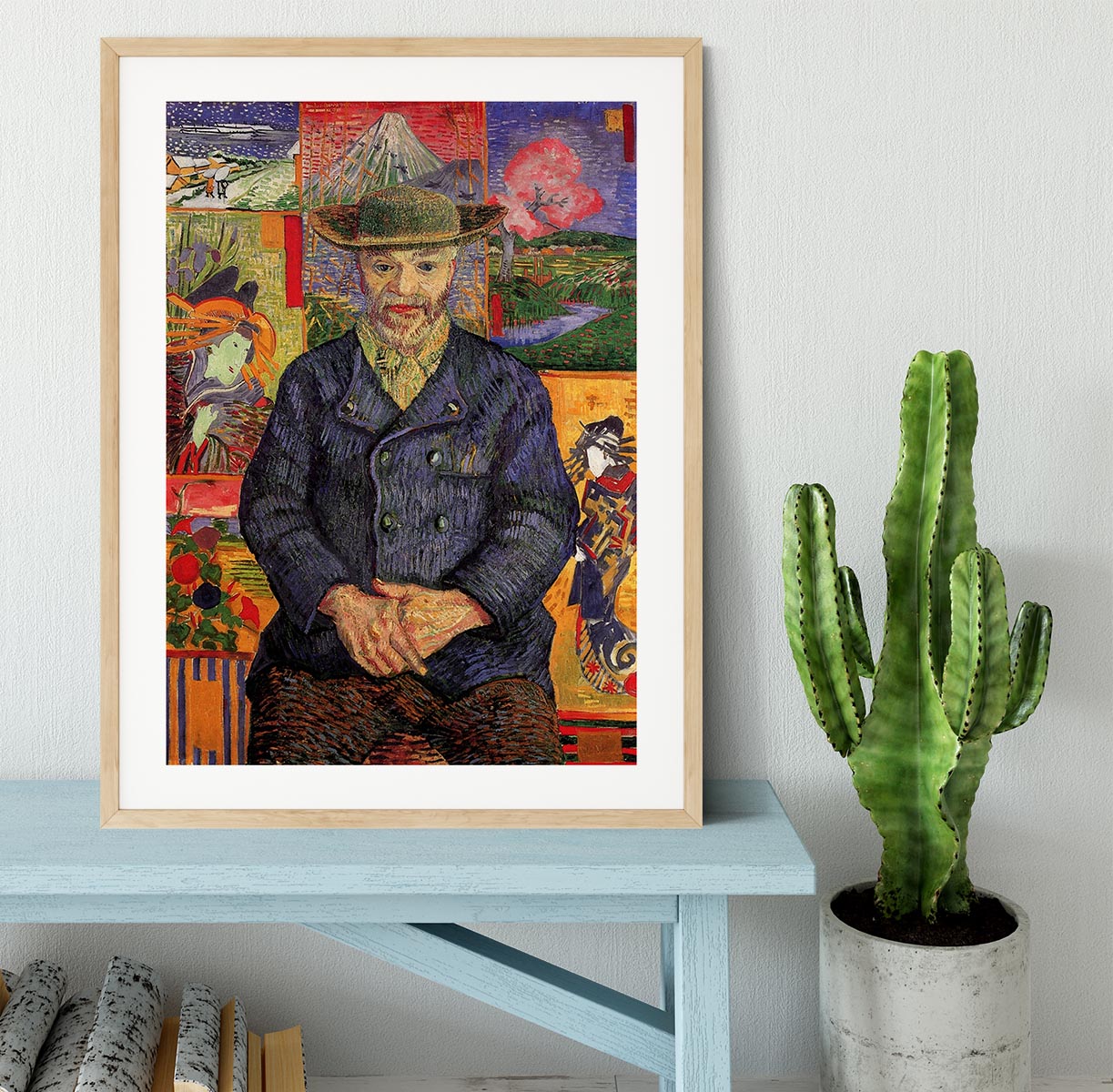 Framed print of Van Gogh's Portrait of Pere Tanguy, showcasing vibrant colors and a handmade frame.