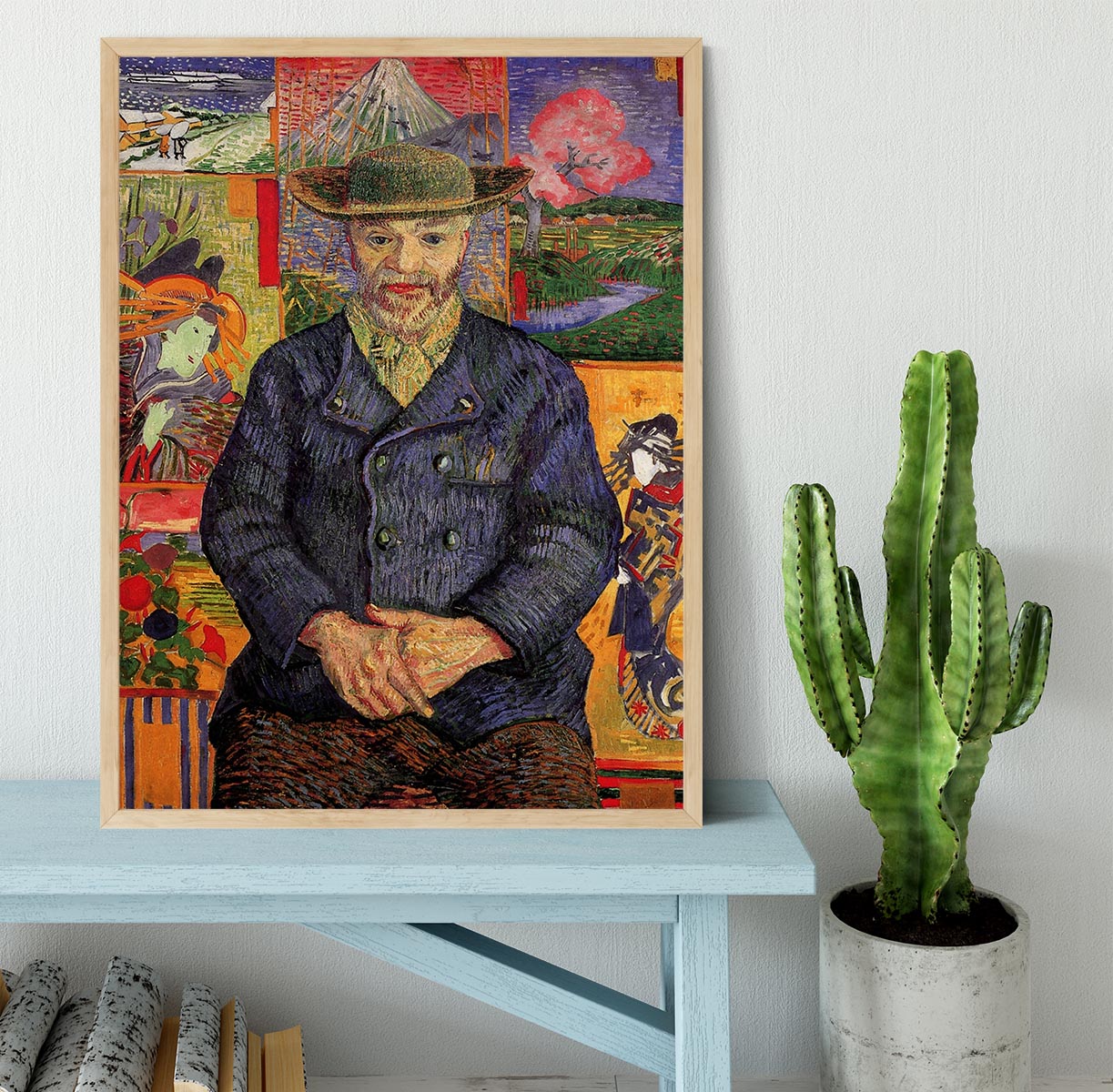 Framed print of Van Gogh's Portrait of Pere Tanguy, showcasing vibrant colors and a handmade frame.