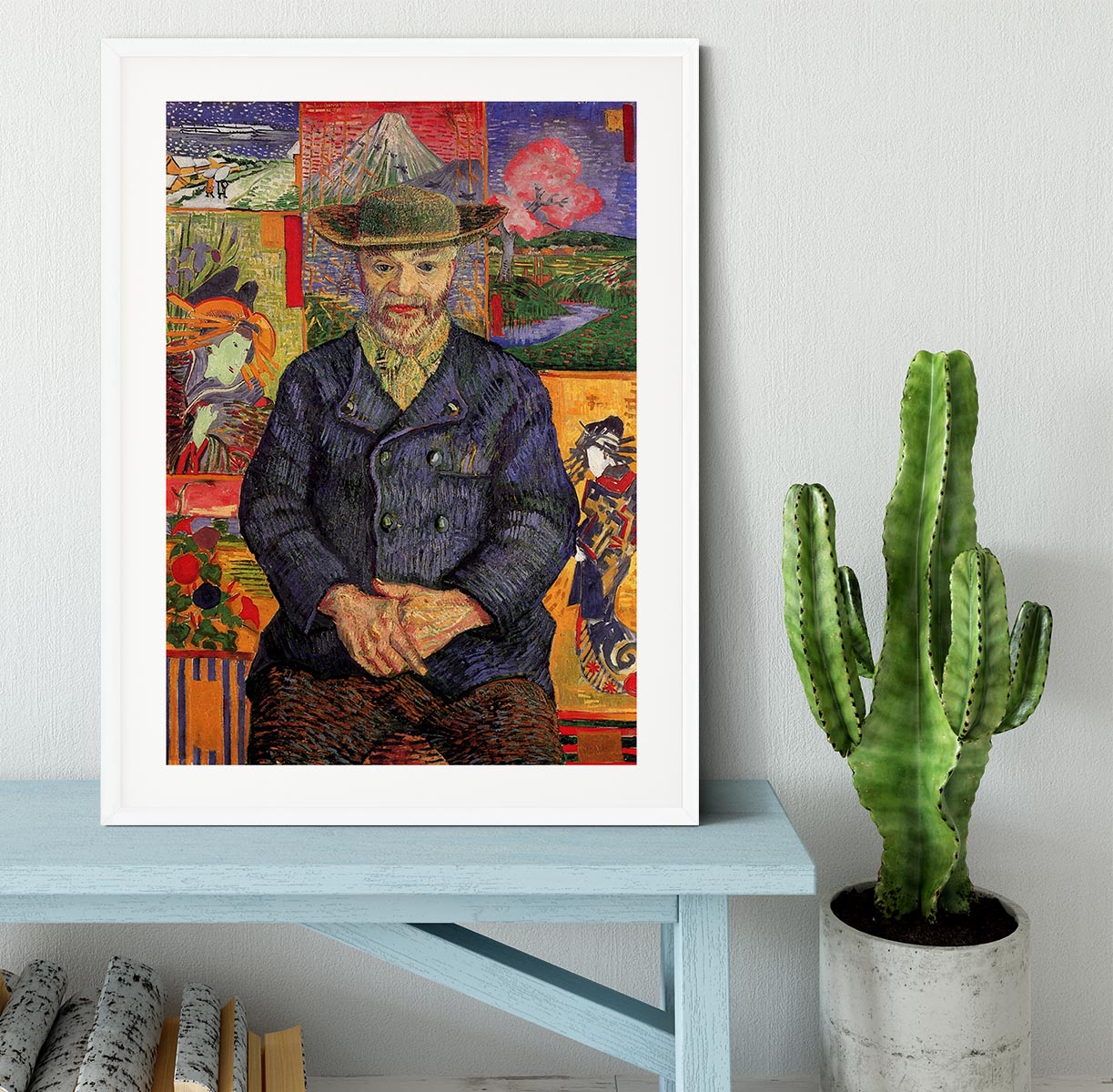 Framed print of Van Gogh's Portrait of Pere Tanguy, showcasing vibrant colors and a handmade frame.