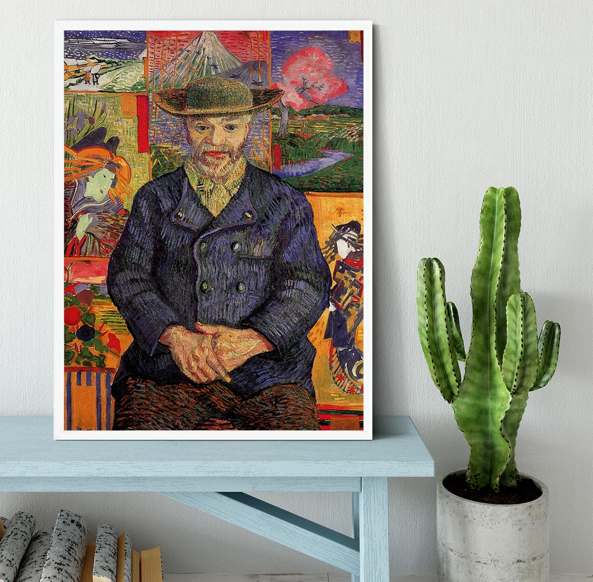 Framed print of Van Gogh's Portrait of Pere Tanguy, showcasing vibrant colors and a handmade frame.