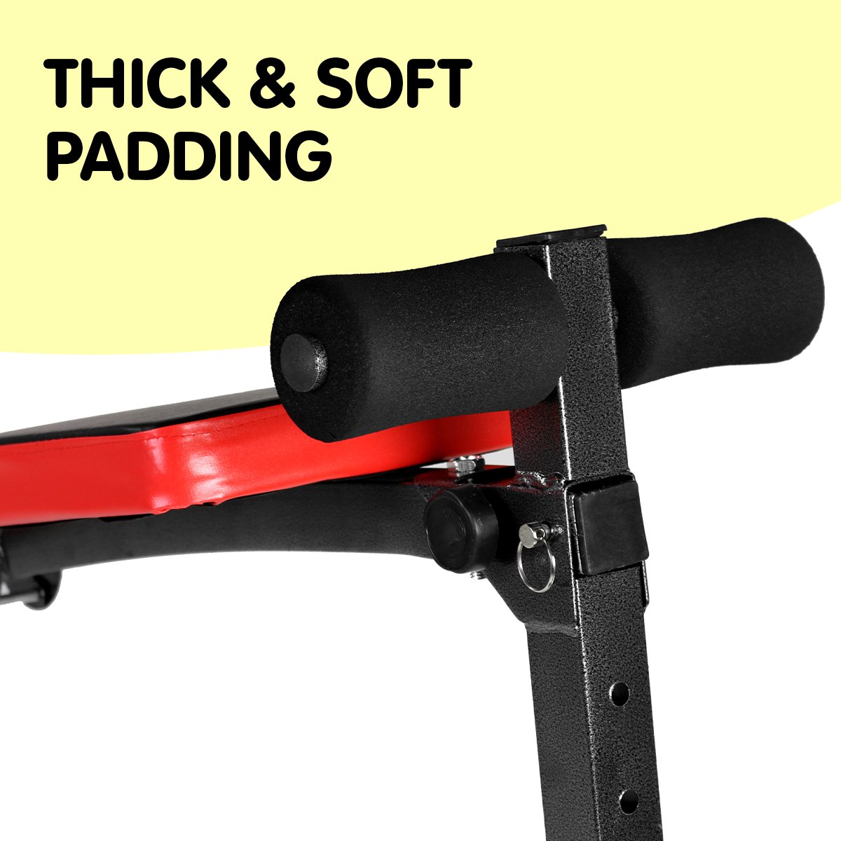 Powertrain Inclined Sit Up Bench with Resistance Bands, featuring adjustable incline and padded foam rollers, designed for home workouts.