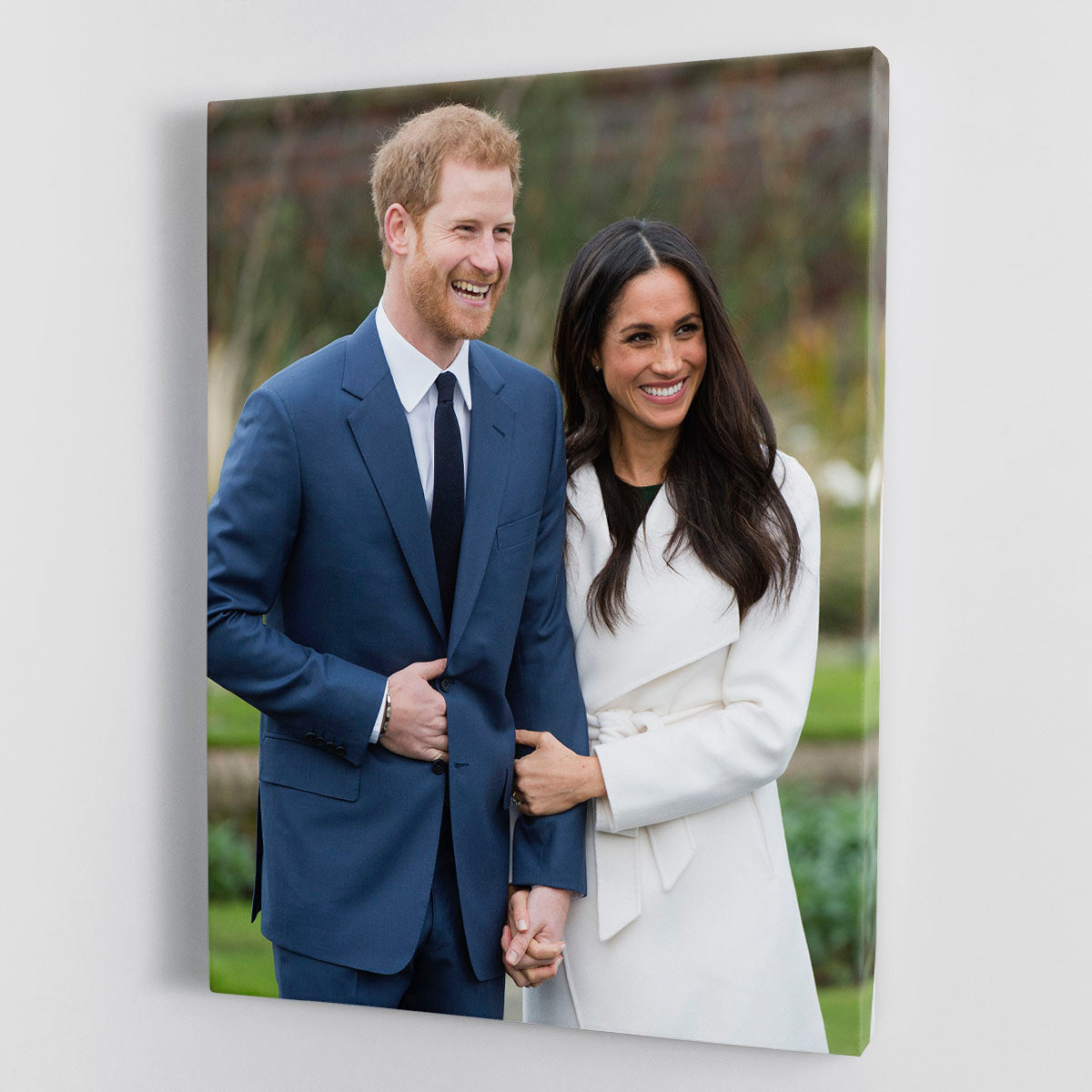 Canvas print celebrating the engagement of Prince Harry and Meghan Markle, featuring elegant modern art and vibrant colors.