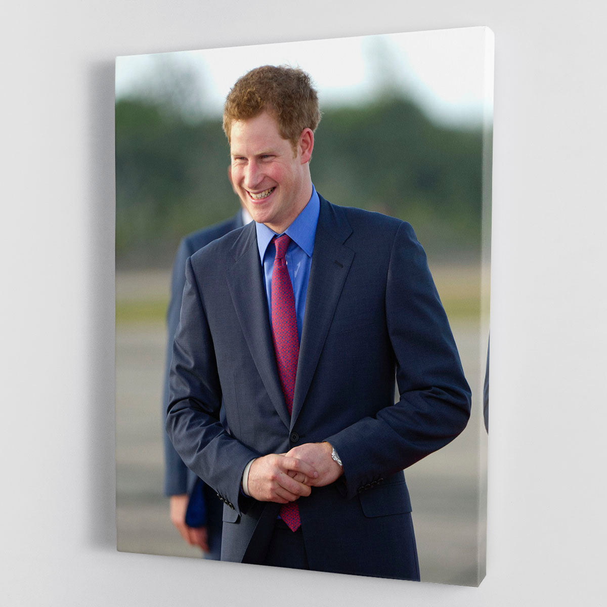 Canvas print of Prince Harry during his royal visit to Belize, showcasing vibrant colors and detailed imagery.