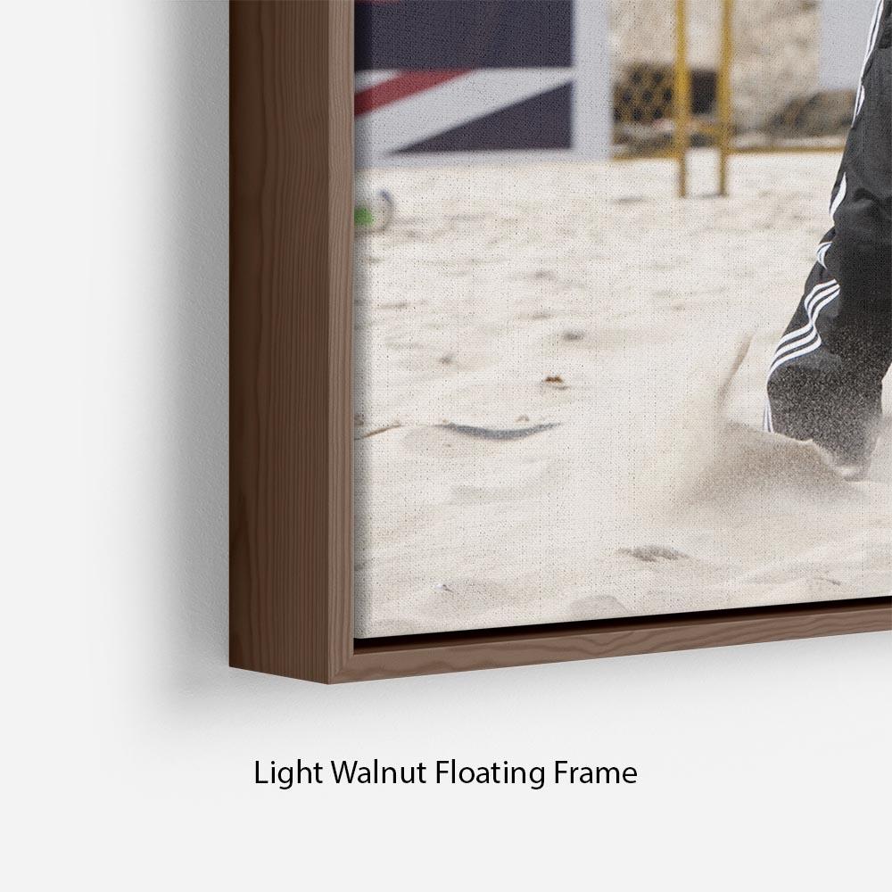 Abstract wall art featuring Prince Harry playing volleyball in Rio de Janeiro, Brazil, framed in an elegant floating frame.