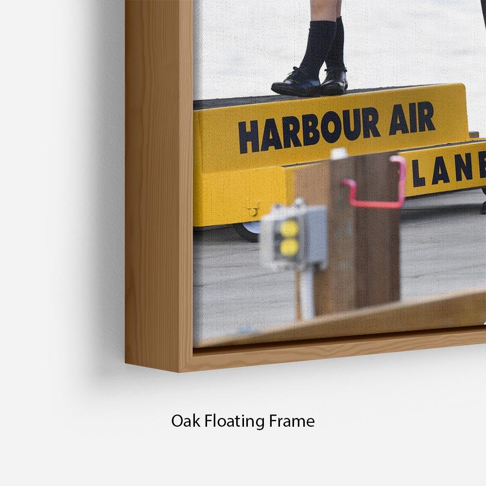 Abstract wall art featuring Prince William, Kate, George, and Charlotte in Canada, elegantly framed in a floating wooden frame.