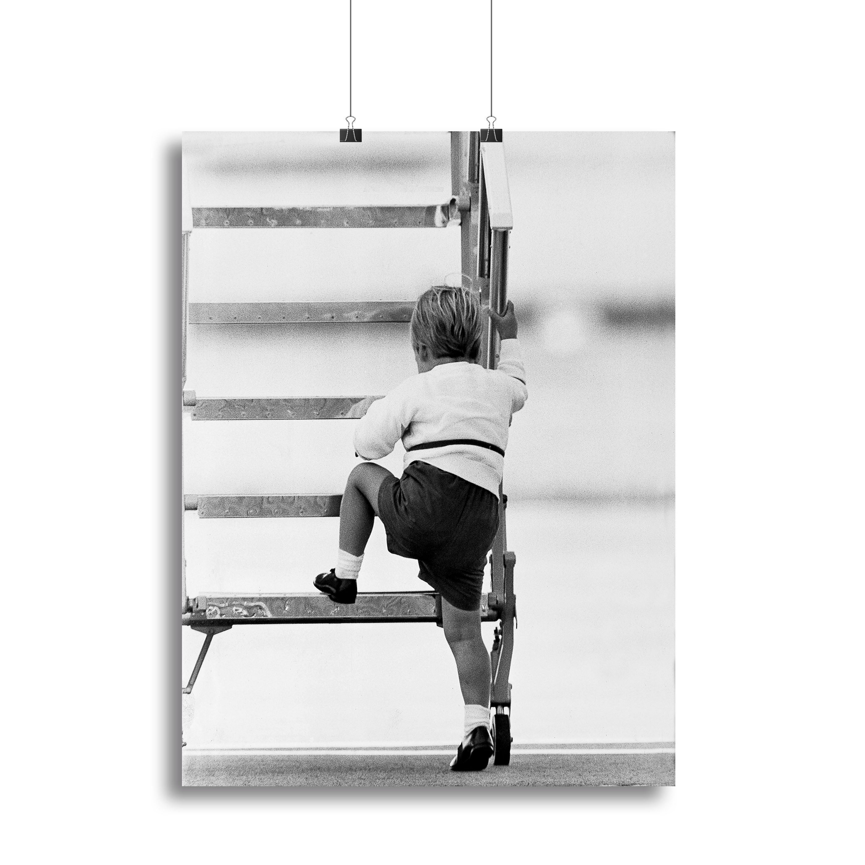 Canvas print of Prince William climbing stairs at Aberdeen Airport, showcasing royal elegance and charm.