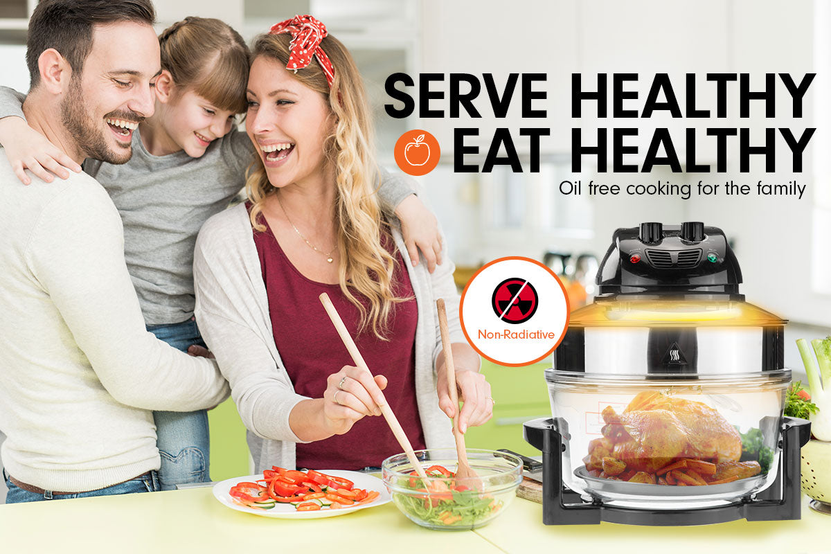 Pronti 17L Family Turbo Convection Oven Broiler Cooker in black with stainless steel extender ring and various cooking accessories.