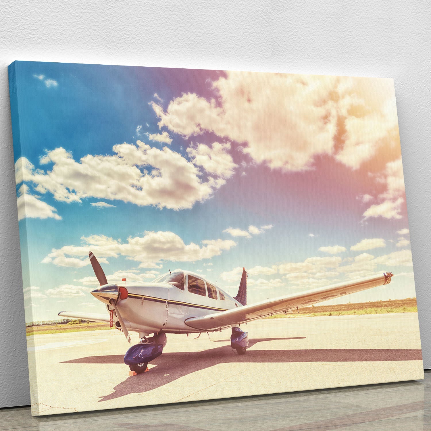 A beautifully designed canvas print of a propeller plane, showcasing intricate details and vibrant colors, perfect for aviation enthusiasts.