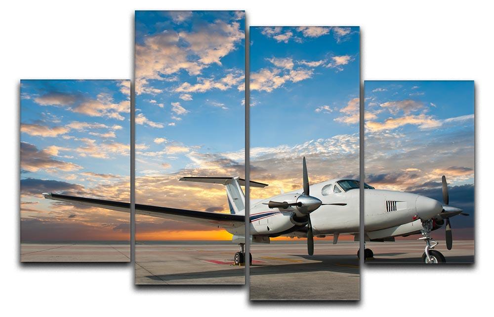 A 4-panel canvas artwork depicting a propeller plane parked at an airport, showcasing vibrant colors and intricate details.