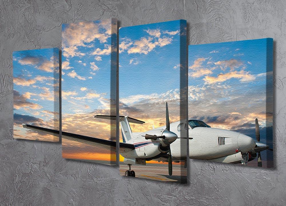 A 4-panel canvas artwork depicting a propeller plane parked at an airport, showcasing vibrant colors and intricate details.