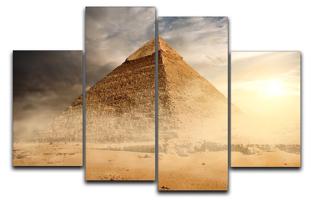 A stunning 4-split canvas artwork featuring a pyramid in sand dust under a cloudy sky, creating a dynamic visual effect.