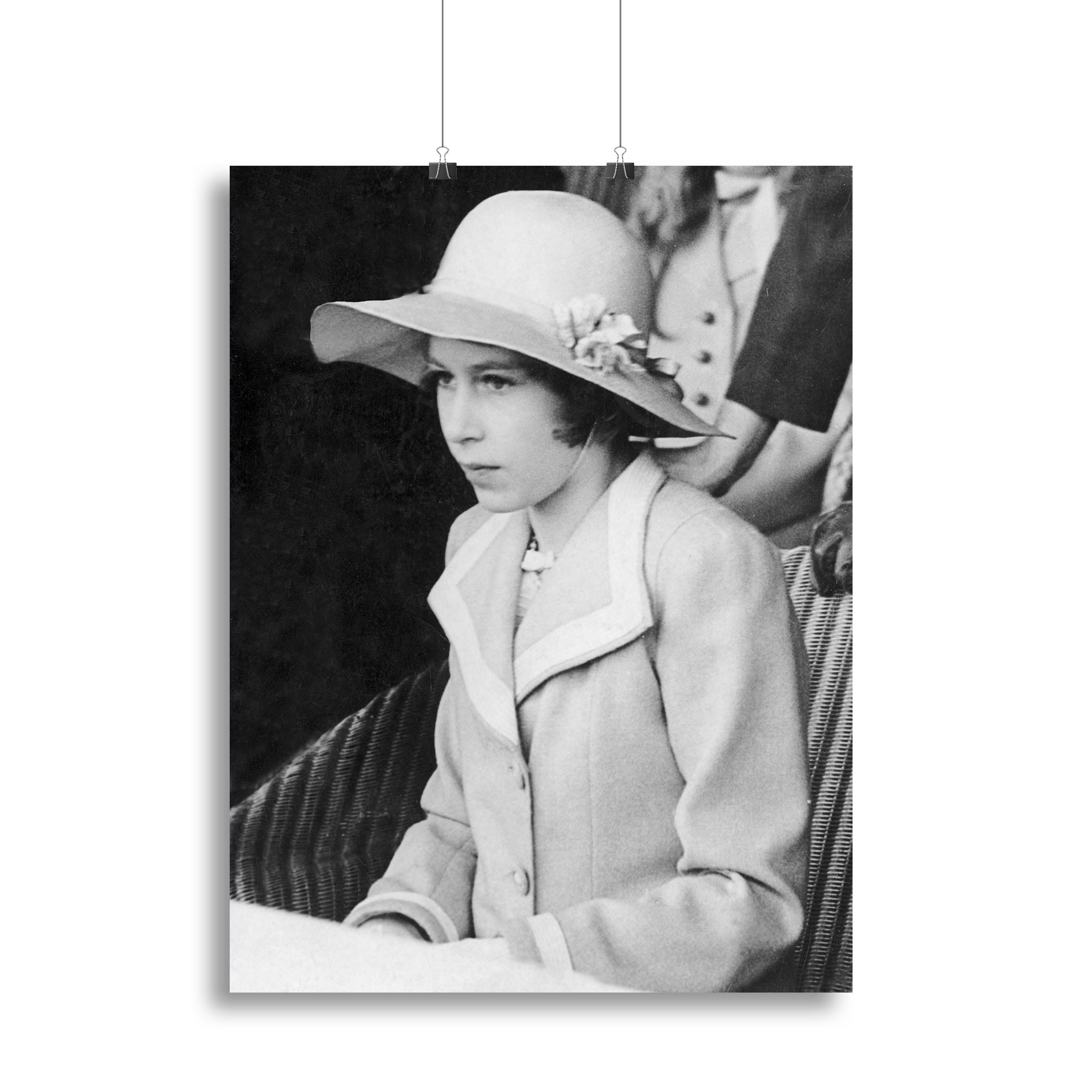 Canvas print of young Queen Elizabeth II seated in a hat, showcasing historical elegance.