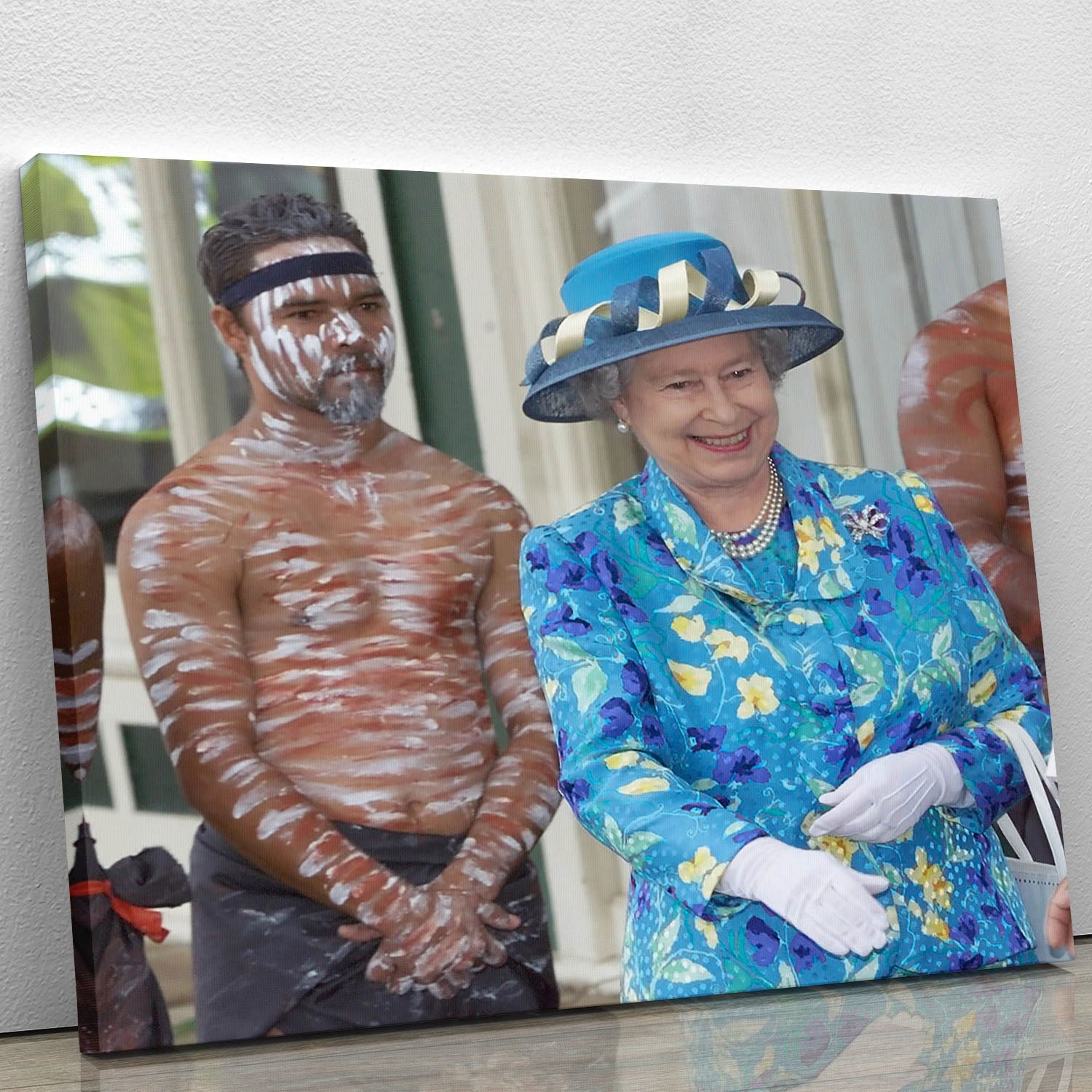 Canvas print featuring Queen Elizabeth II with an Aboriginal dancer in Australia, showcasing cultural heritage and artistry.
