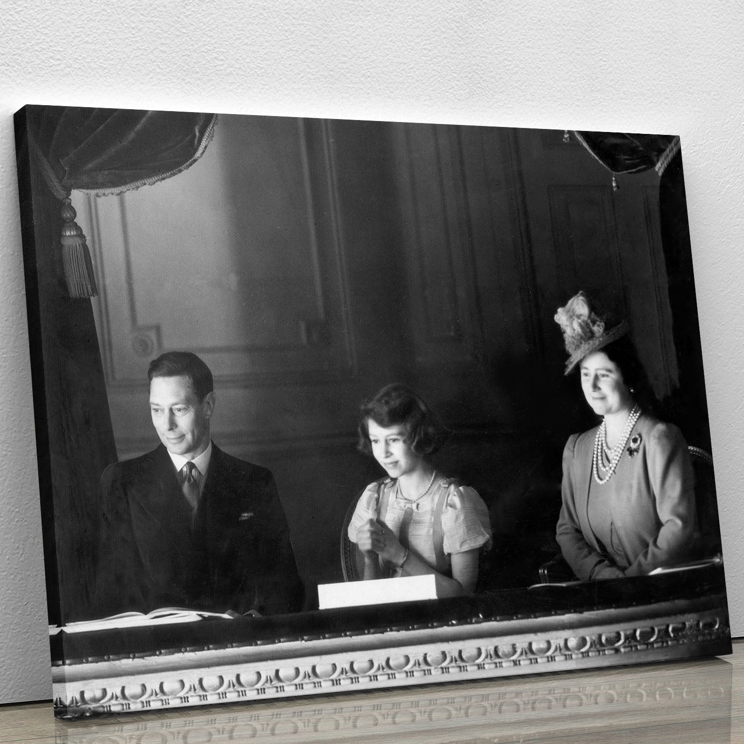 Canvas print of Queen Elizabeth II with her parents, showcasing historical elegance and charm.