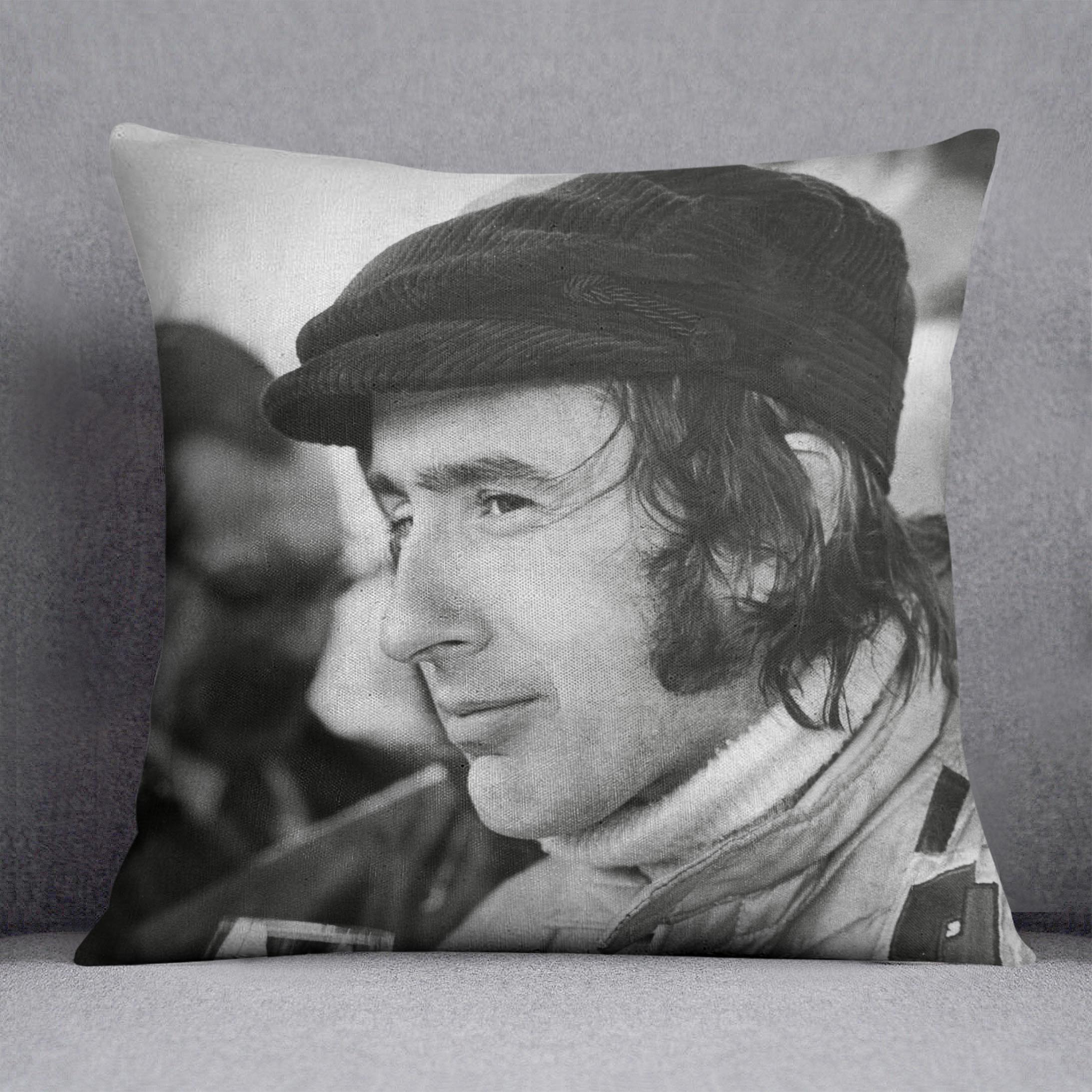 Colorful abstract cushion featuring racing driver Jackie Stewart from 1971, made of luxurious vegan faux suede.