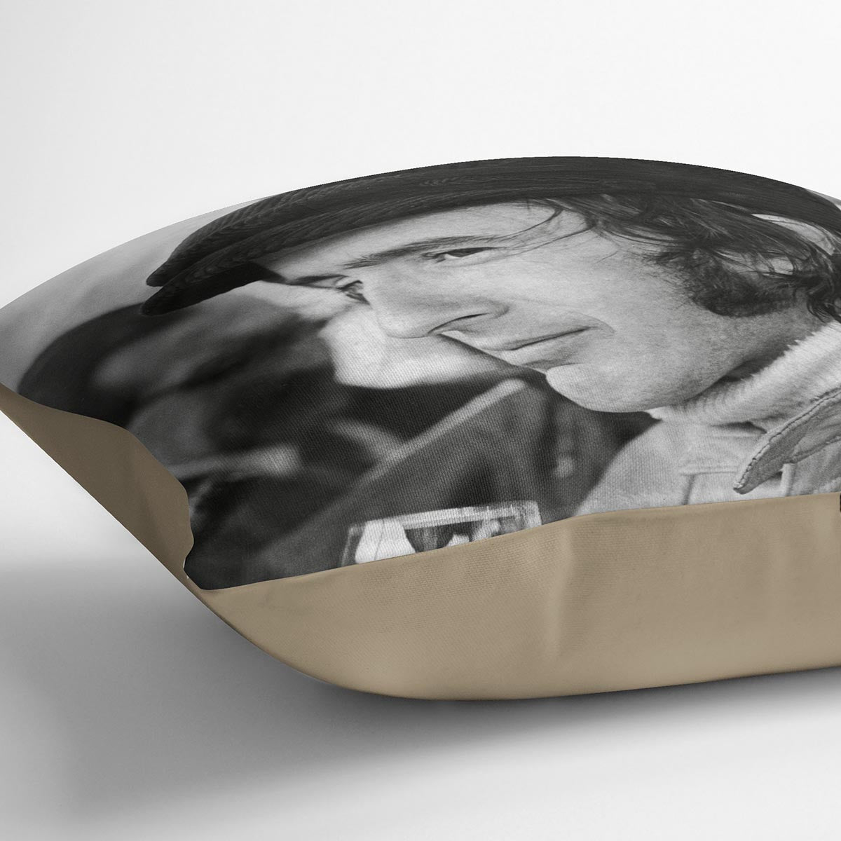 Colorful abstract cushion featuring racing driver Jackie Stewart from 1971, made of luxurious vegan faux suede.