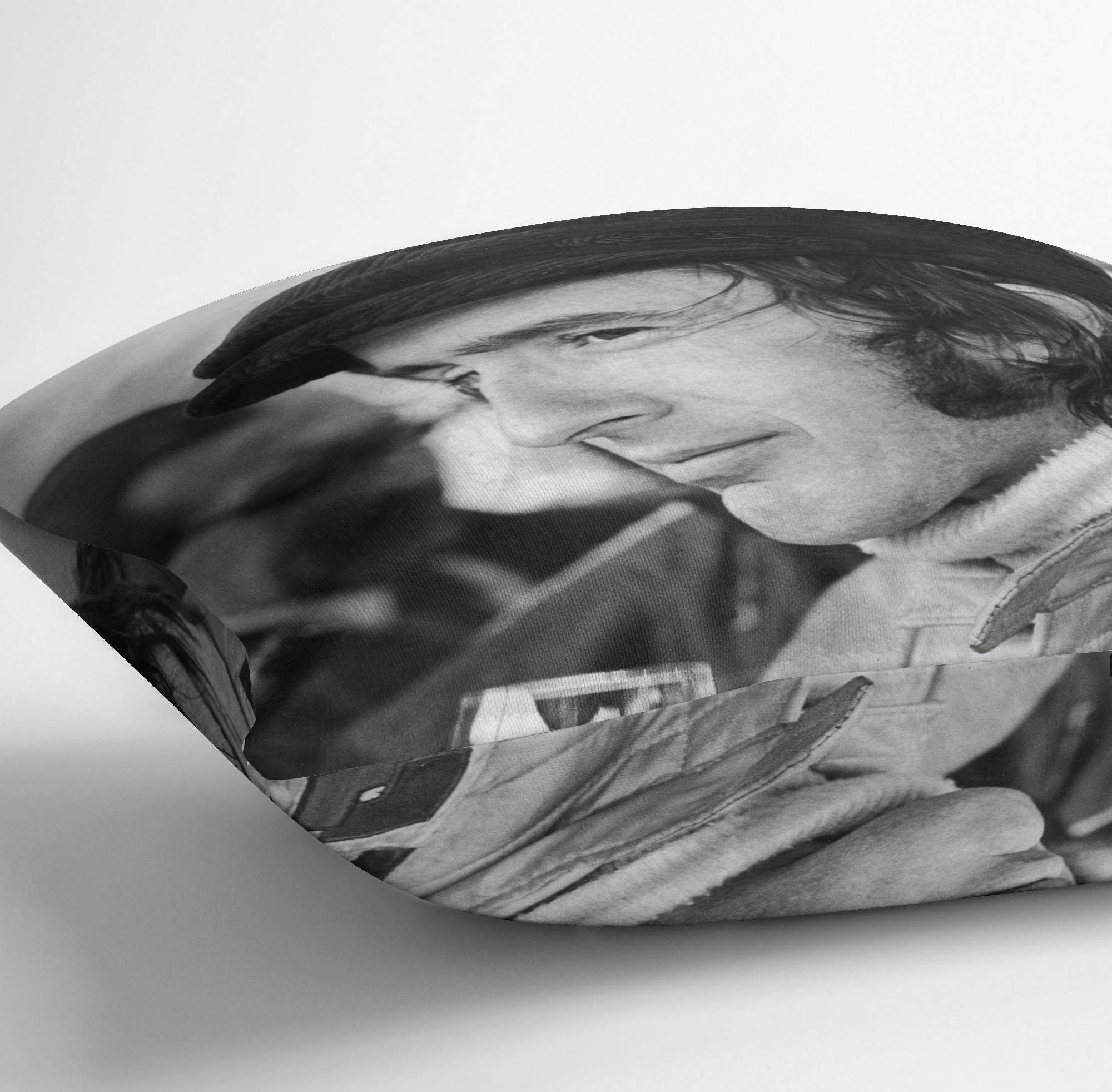 Colorful abstract cushion featuring racing driver Jackie Stewart from 1971, made of luxurious vegan faux suede.