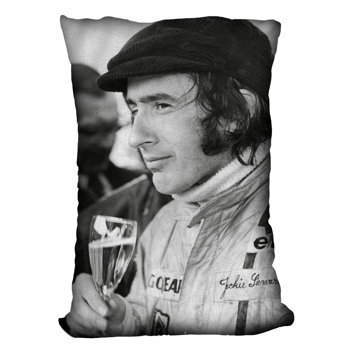 Colorful abstract cushion featuring racing driver Jackie Stewart from 1971, made of luxurious vegan faux suede.