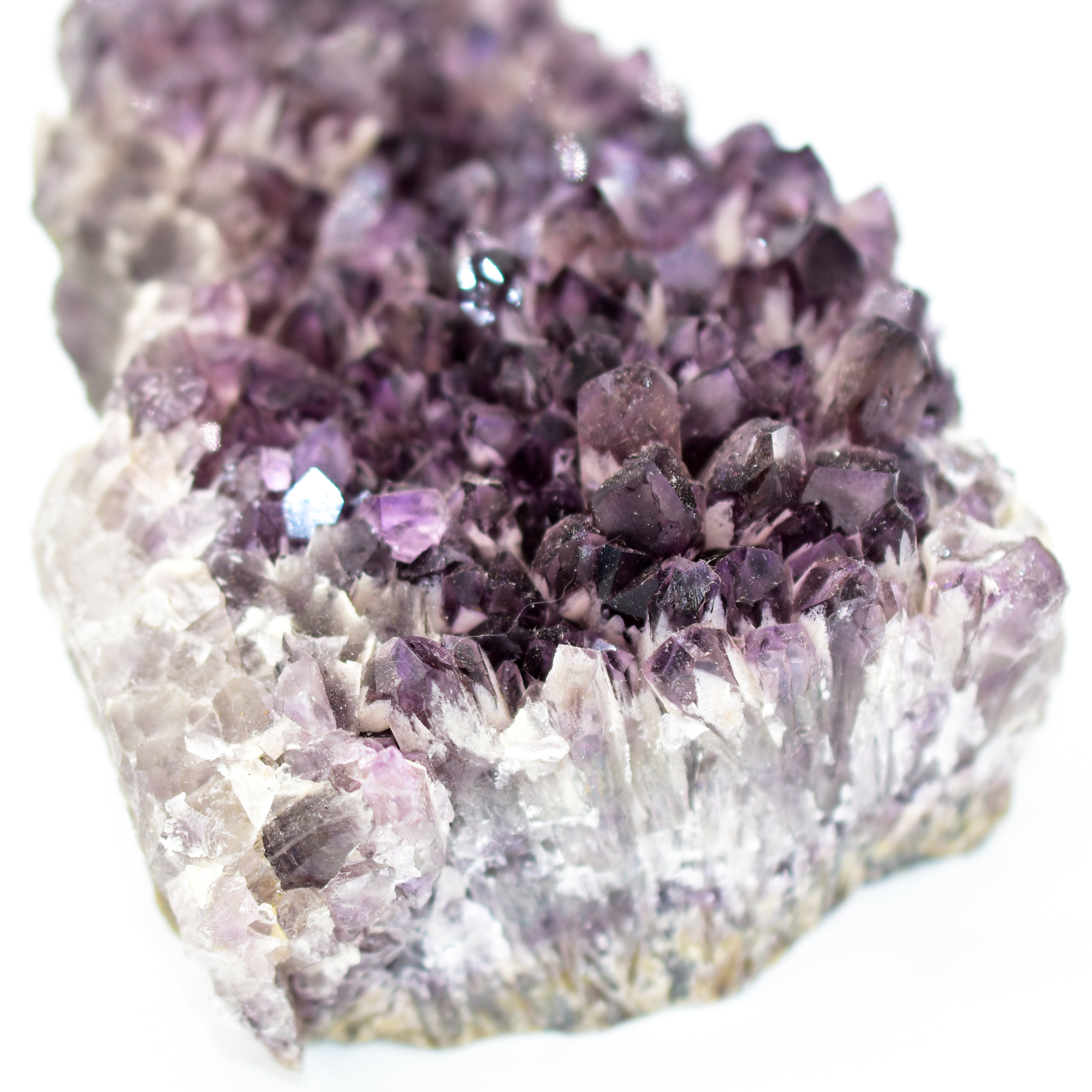 A large, stunning Elestial Amethyst cluster from Bahia, Brazil, showcasing deep purple hues and intricate formations, perfect for display.