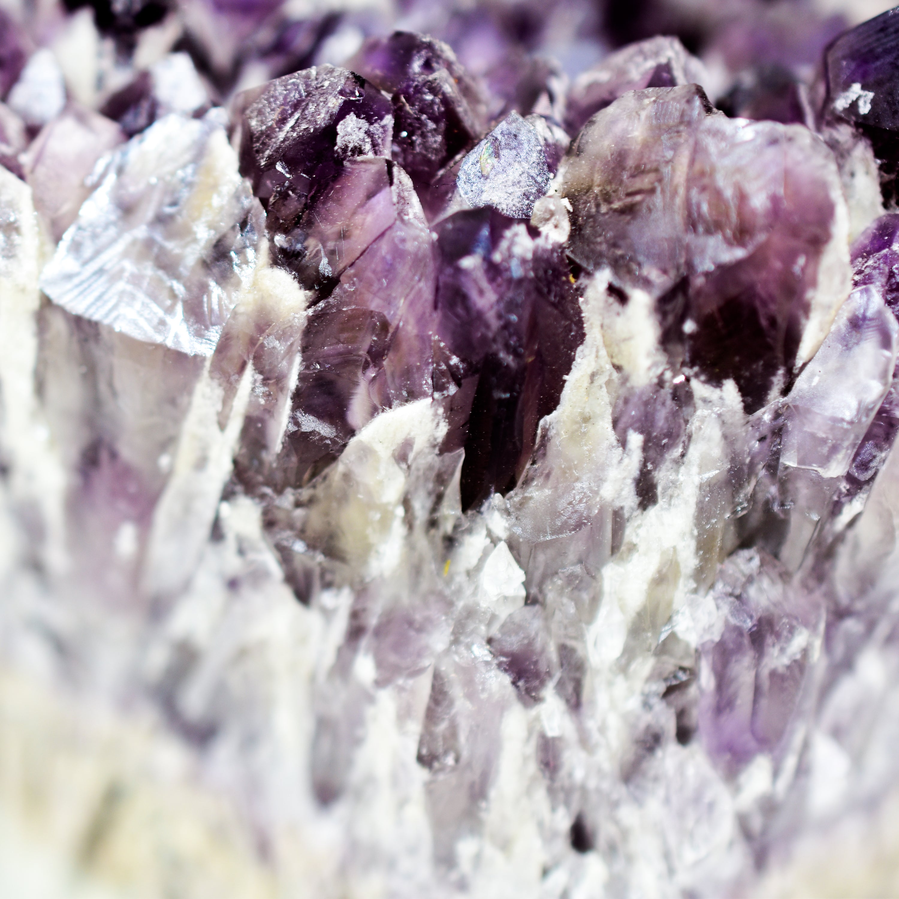 A large, stunning Elestial Amethyst cluster from Bahia, Brazil, showcasing deep purple hues and intricate formations, perfect for display.