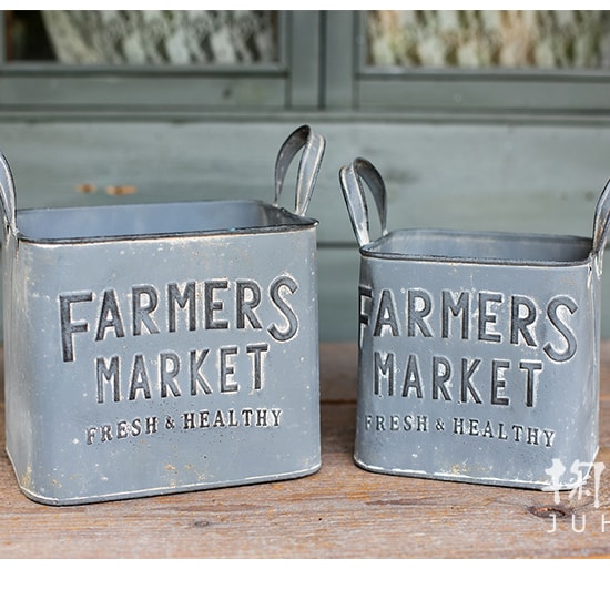 Rectangular gray flower pot made of iron, featuring a rustic design, perfect for decorative use in gardens or homes.