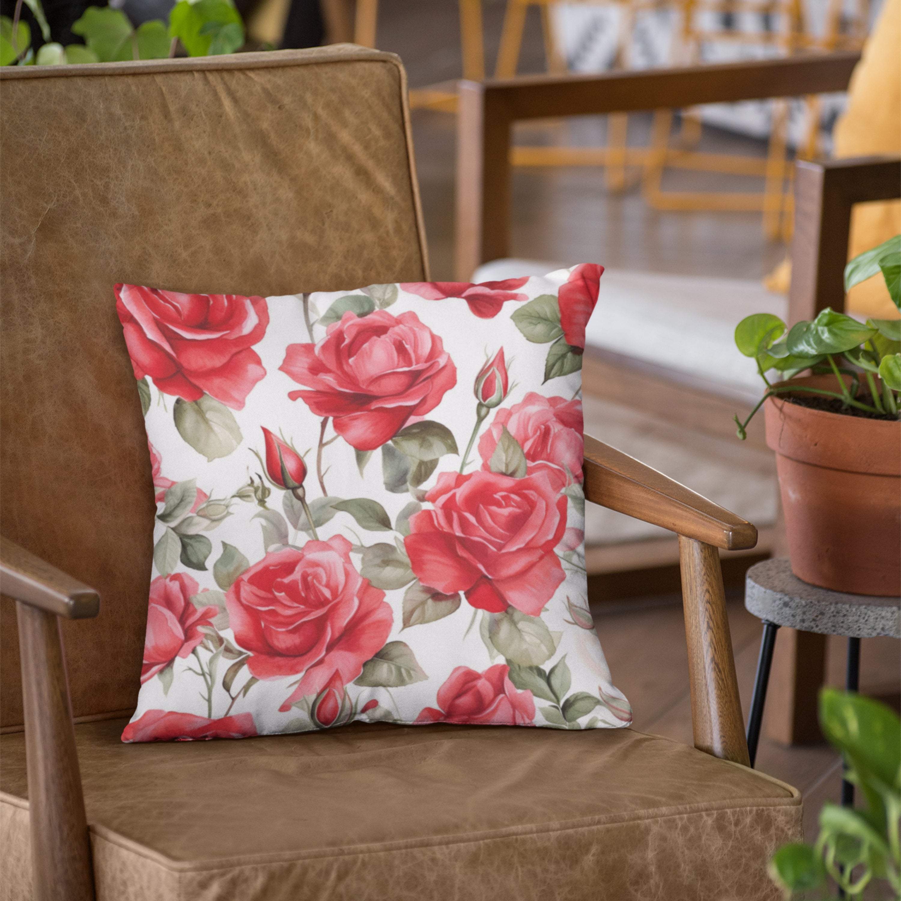 Red Rose Floral Throw Pillow with vibrant rose design on one side and light cream back, perfect for home decor.