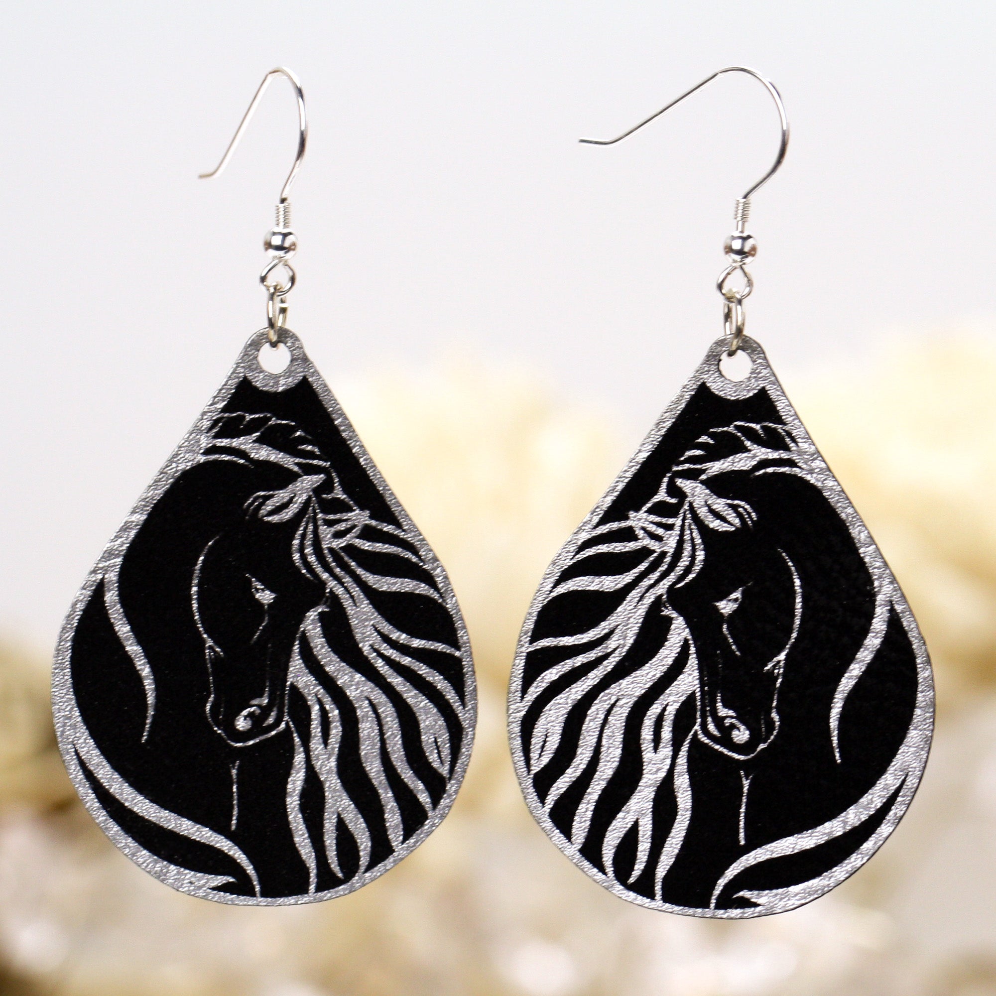 Regal Gypsy Horse Head Earrings in multiple colors, featuring lightweight faux leather and sterling silver accents.