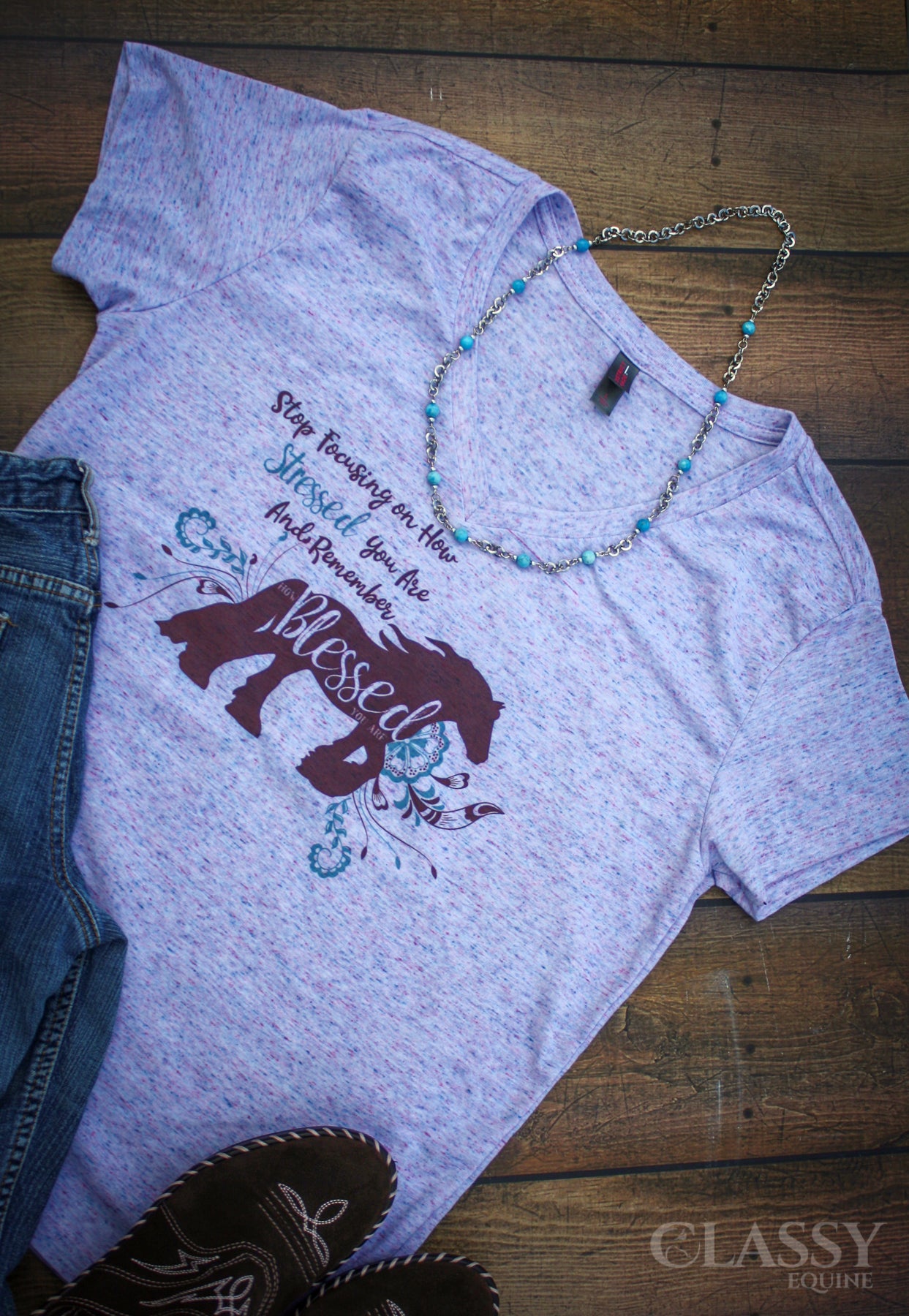 A comfortable women's v-neck t-shirt featuring the quote 'Remember How Blessed You Are' with a stylish design, available in various sizes.