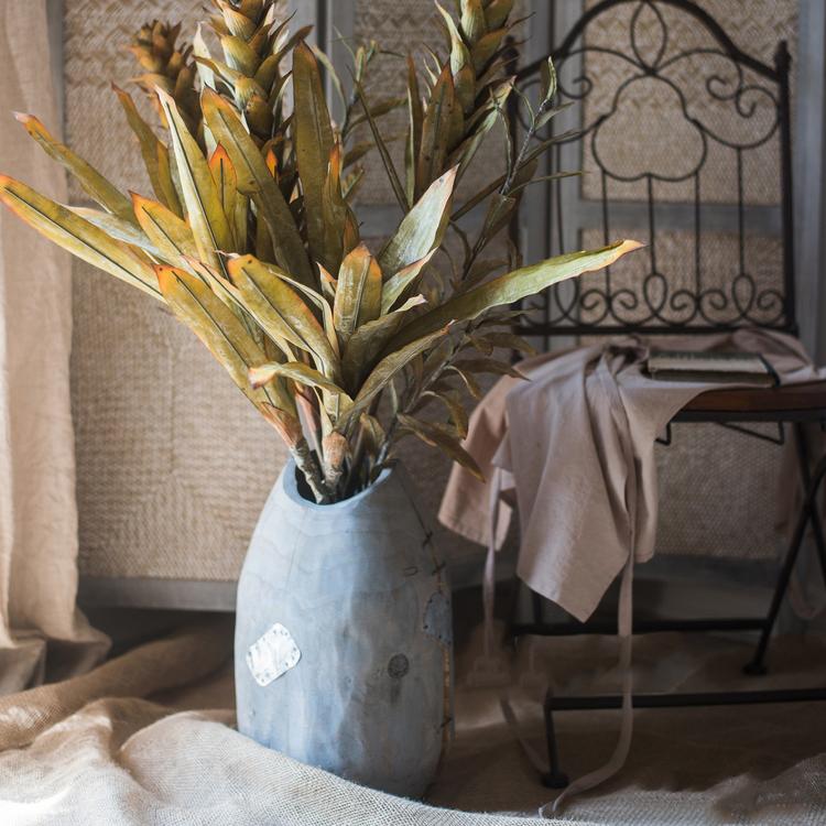 A collection of Renaissance Autumn artificial dried flowers and plants in various styles and colors, showcasing their realistic appearance and elegant design.