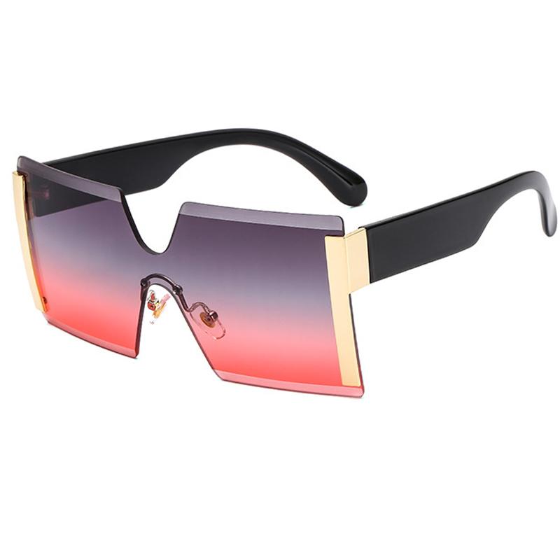 Retro oversized frameless sunglasses for women, featuring a stylish design and UV400 protection.