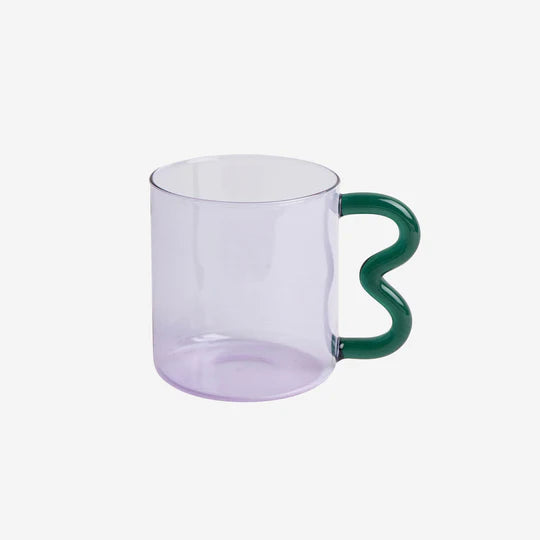 A colorful Retro Wavy Mug with a stained-glass finish and ergonomic handle, showcasing its unique design and vibrant colors.