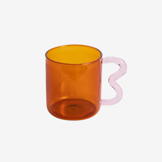 A colorful Retro Wavy Mug with a stained-glass finish and ergonomic handle, showcasing its unique design and vibrant colors.