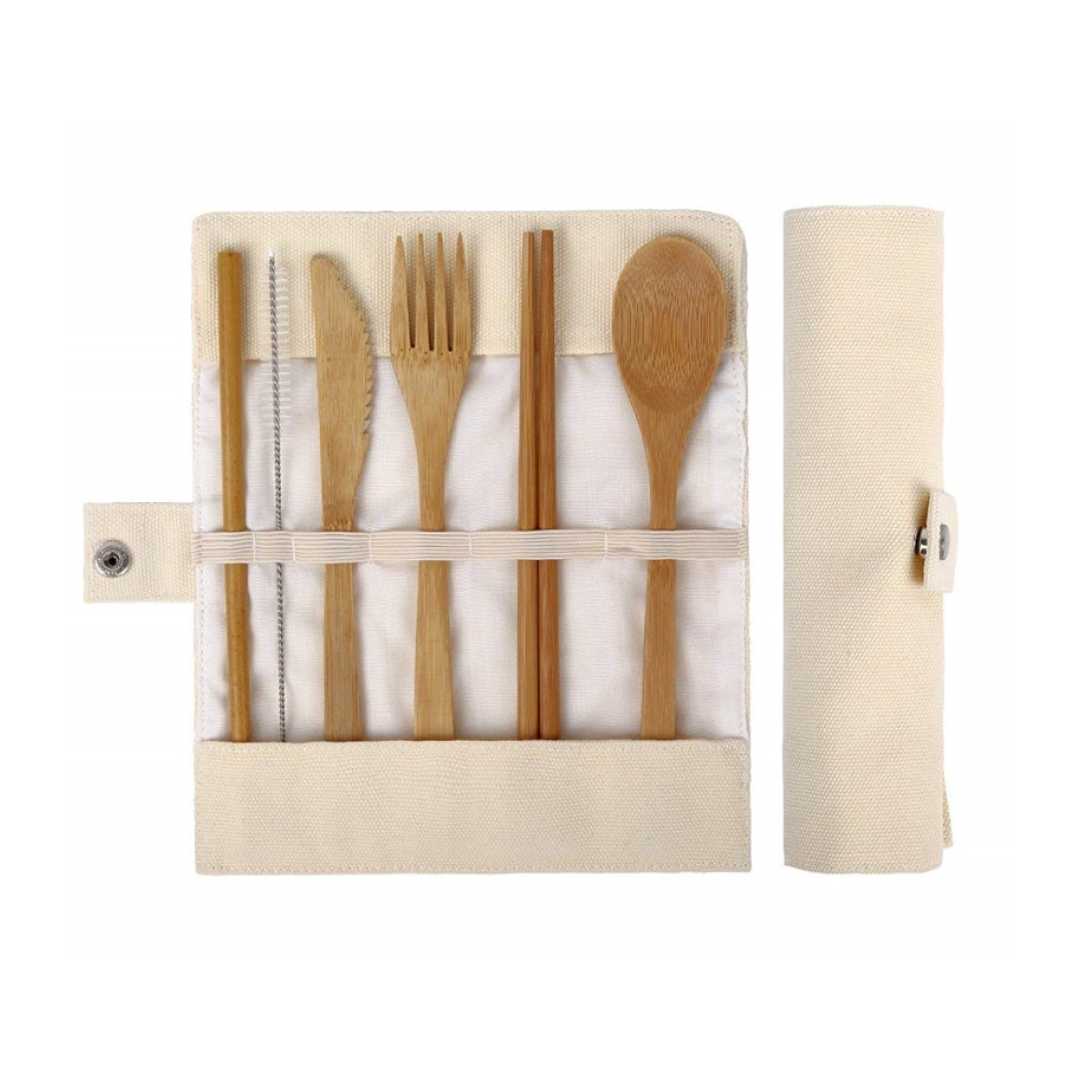 A complete reusable cutlery travel set made from bamboo, including utensils and a durable canvas bag, ideal for eco-friendly dining.
