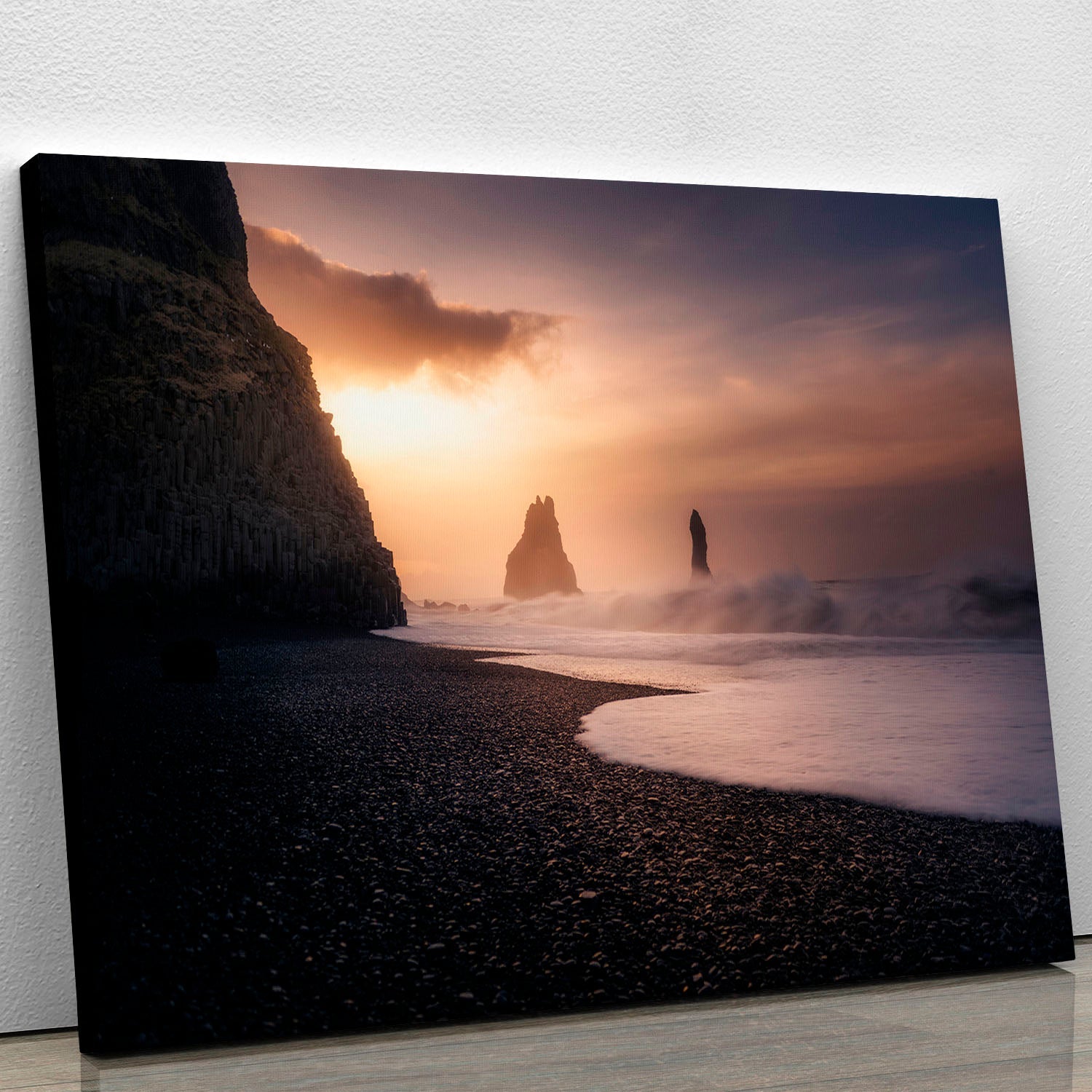 Reynisfjara Sunrise Canvas Print showcasing vibrant colors of sunrise over black sand beach with basalt columns.