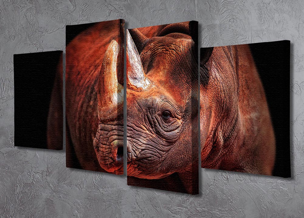 A stunning 4-panel canvas artwork featuring a majestic rhino in a dynamic pose, perfect for enhancing any space.