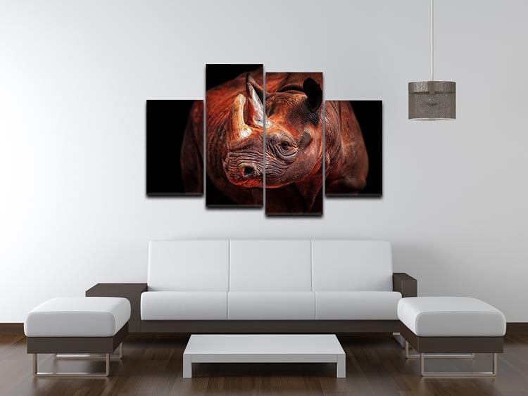 A stunning 4-panel canvas artwork featuring a majestic rhino in a dynamic pose, perfect for enhancing any space.