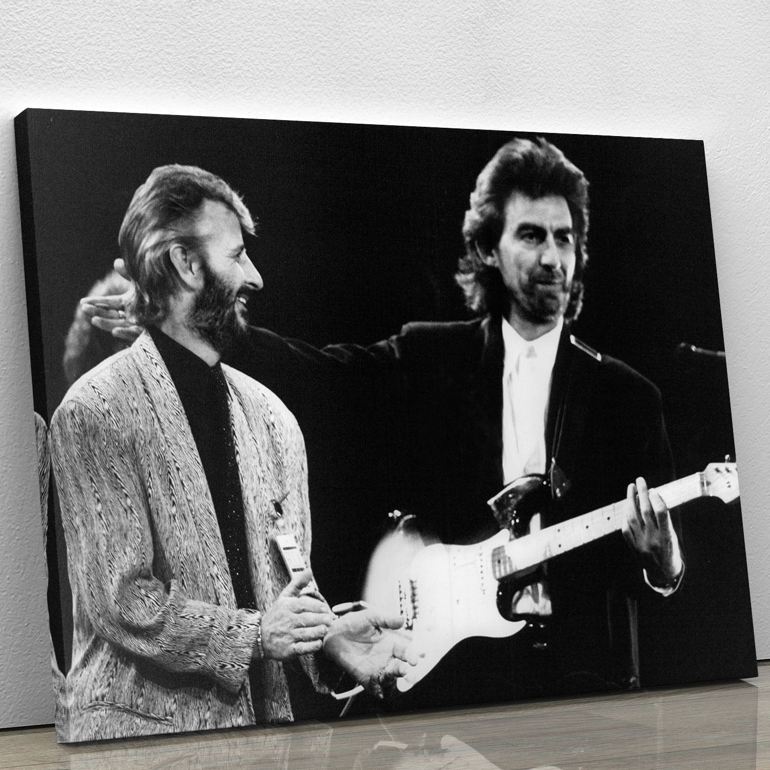 Canvas print featuring Ringo Starr and George Harrison from 1988, showcasing their iconic presence in music history.