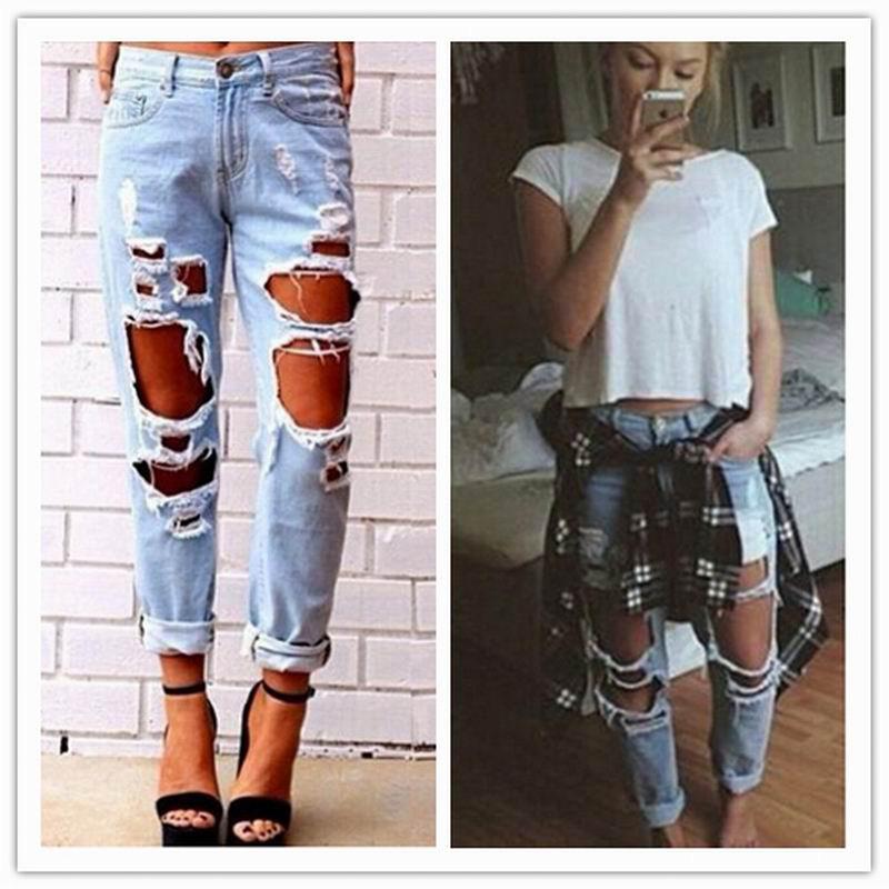 Ripped jeans denim joggers for women featuring knee holes and a slim fit in blue color.