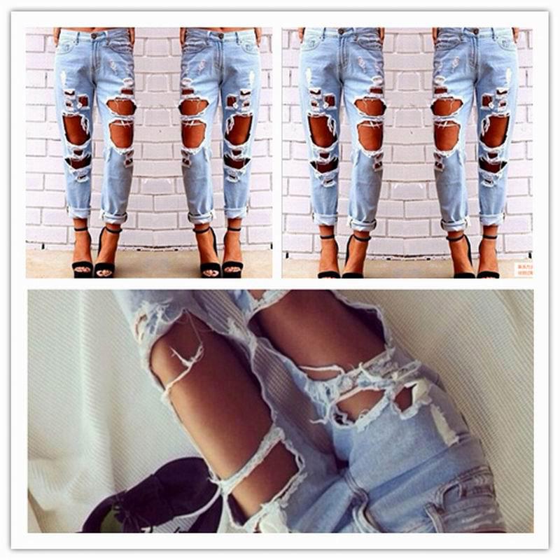 Ripped jeans denim joggers for women featuring knee holes and a slim fit in blue color.